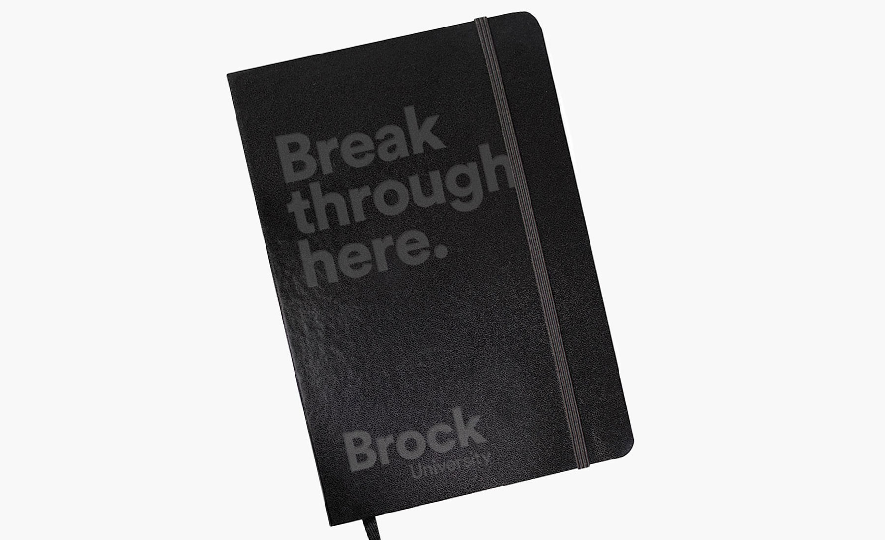 Brock banded notebook as an example of swag.