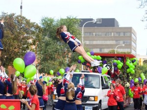 Brock University cheerleaders pump up the crowd at the Niagara Wine Festival's Grande Parade in this file photo.
