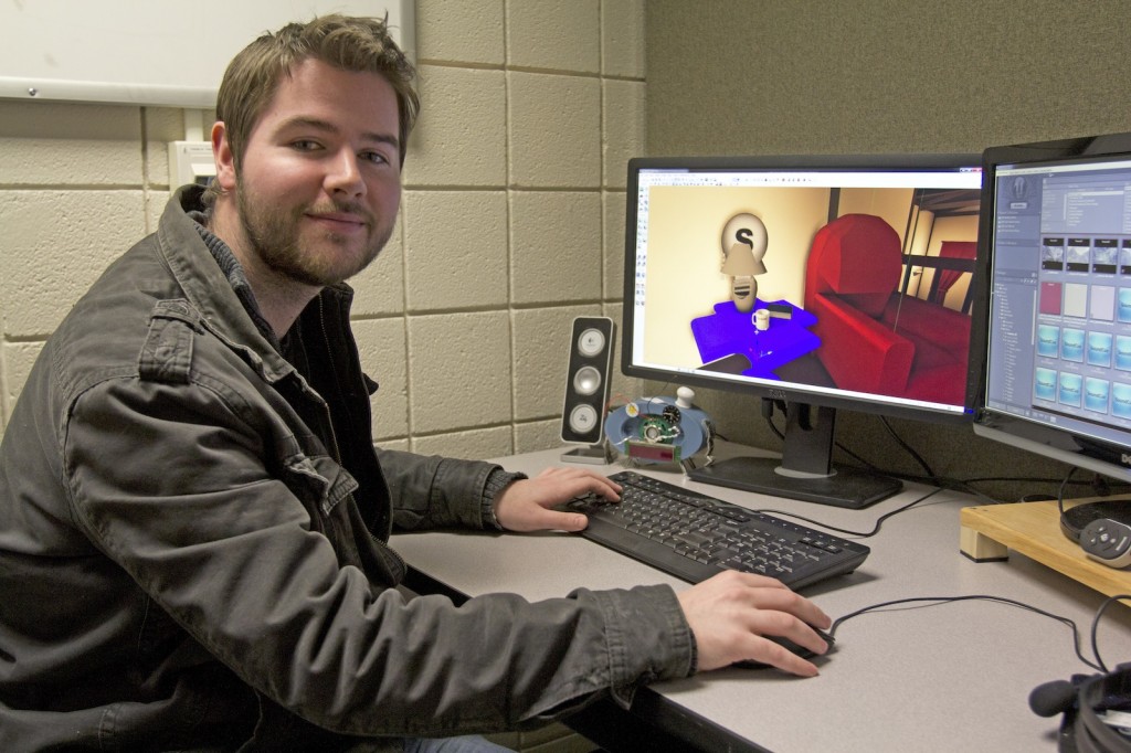 Kev Greene, a fourth-year interactive arts and science student, works on Awaken, a student-developed video headed to the Level Up gamin showcase and competition in Toronto this week. 
