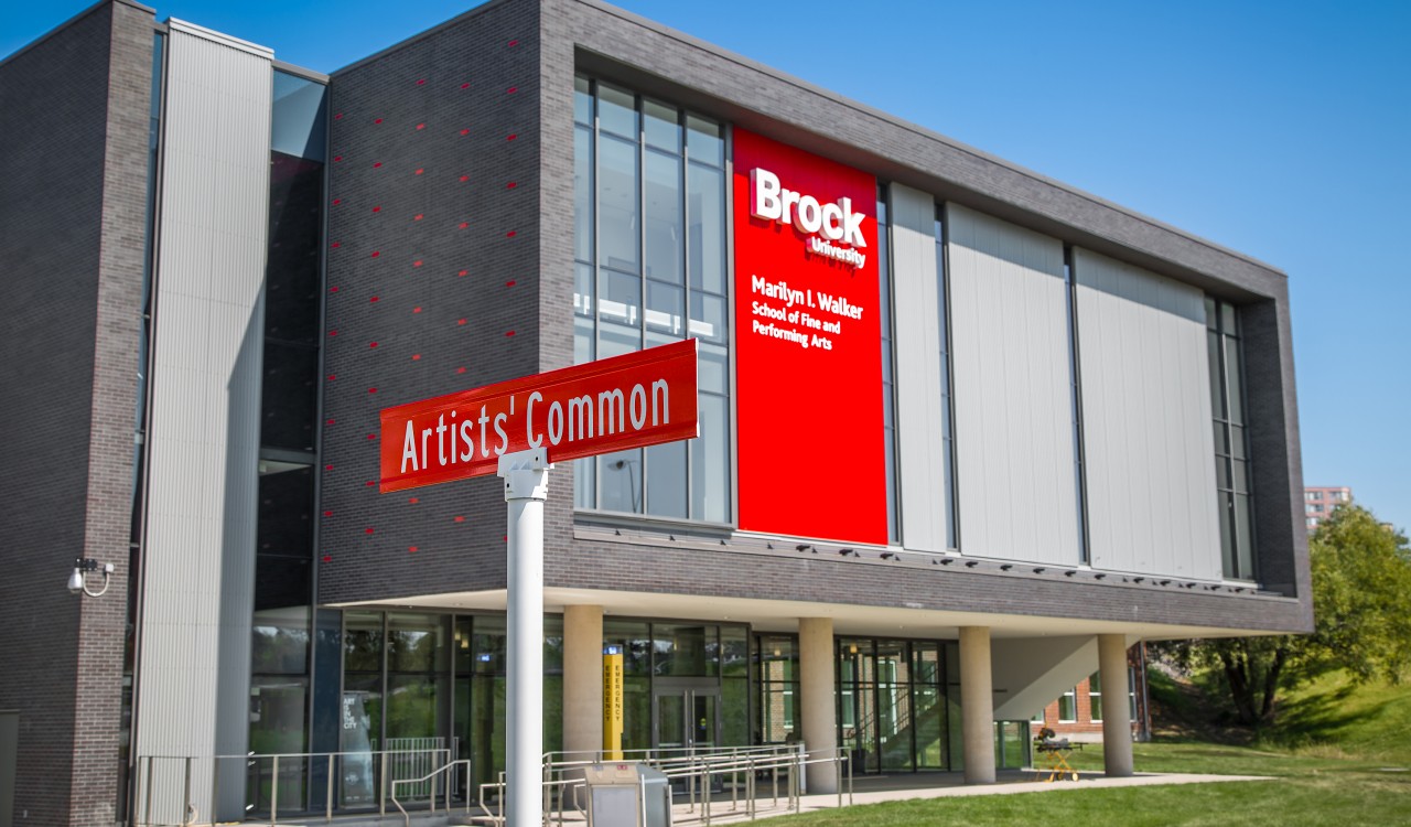 The street sign for Artists' Common can be seen in front of the new MIWSFPA.