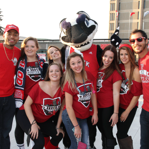 Students pose with Boomer, the Brock Badger.