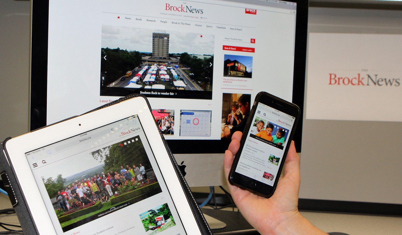 The Brock News is pictured on a desktop, iPhone and iPad.