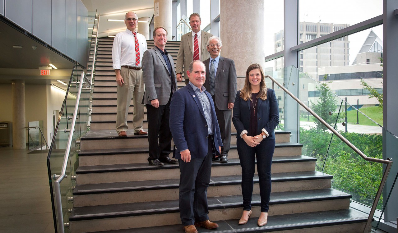 Dan McGrath, bottom left, was named this year's top alumnus by Brock University Alumni Association. Five other alumnus were awarded faculty graduate awards, including Mark Arthur, middle left, Craig Tallman, bottom left, Scott Maxwell, top right, Yousef Haj-Ahmed and Erin Mathany.