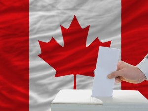 Man puts ballot in voting box in front of Canadian flag in this graphic.