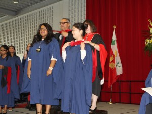 Aysha Othman, left, graduates with a Masters of Accountancy Oct. 17.