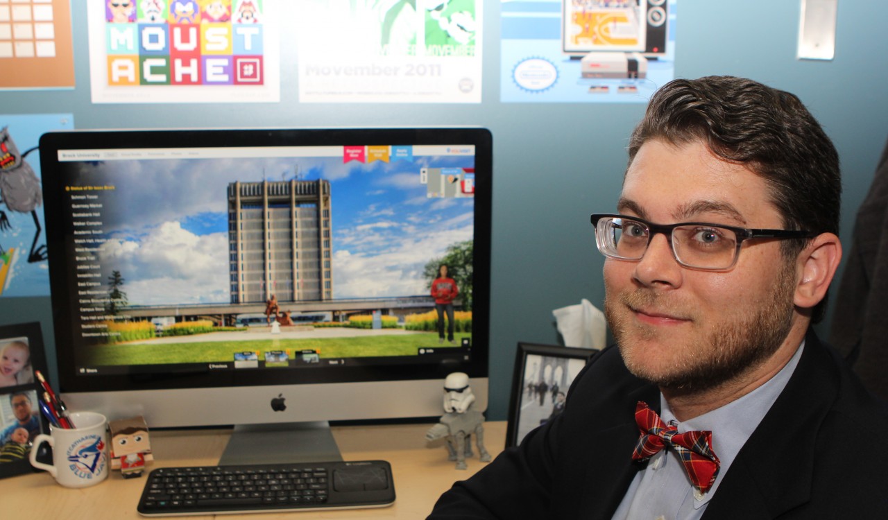 Joseph Gottli shows the opening page of Brock University's new virtual tour.