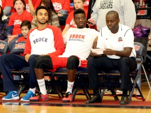 Brock University men's basketball players Dani Elgadi and Johneil Simpson with head coach Charles Kissi at Badgers vs. Bullying on Oct. 22.