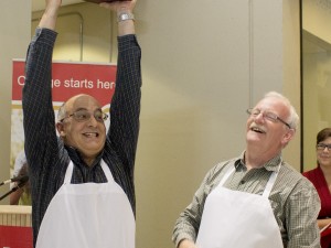 Hichem Ben-El-Mechaiekh, left, and Allan Castle, of the Faculty of Mathematics and Sciences celebrate earning the Souper Bowl during the annual Souper Star lunch fundraiser for the United Way. The Portuguese bean and sausage soup they served earned the most votes.