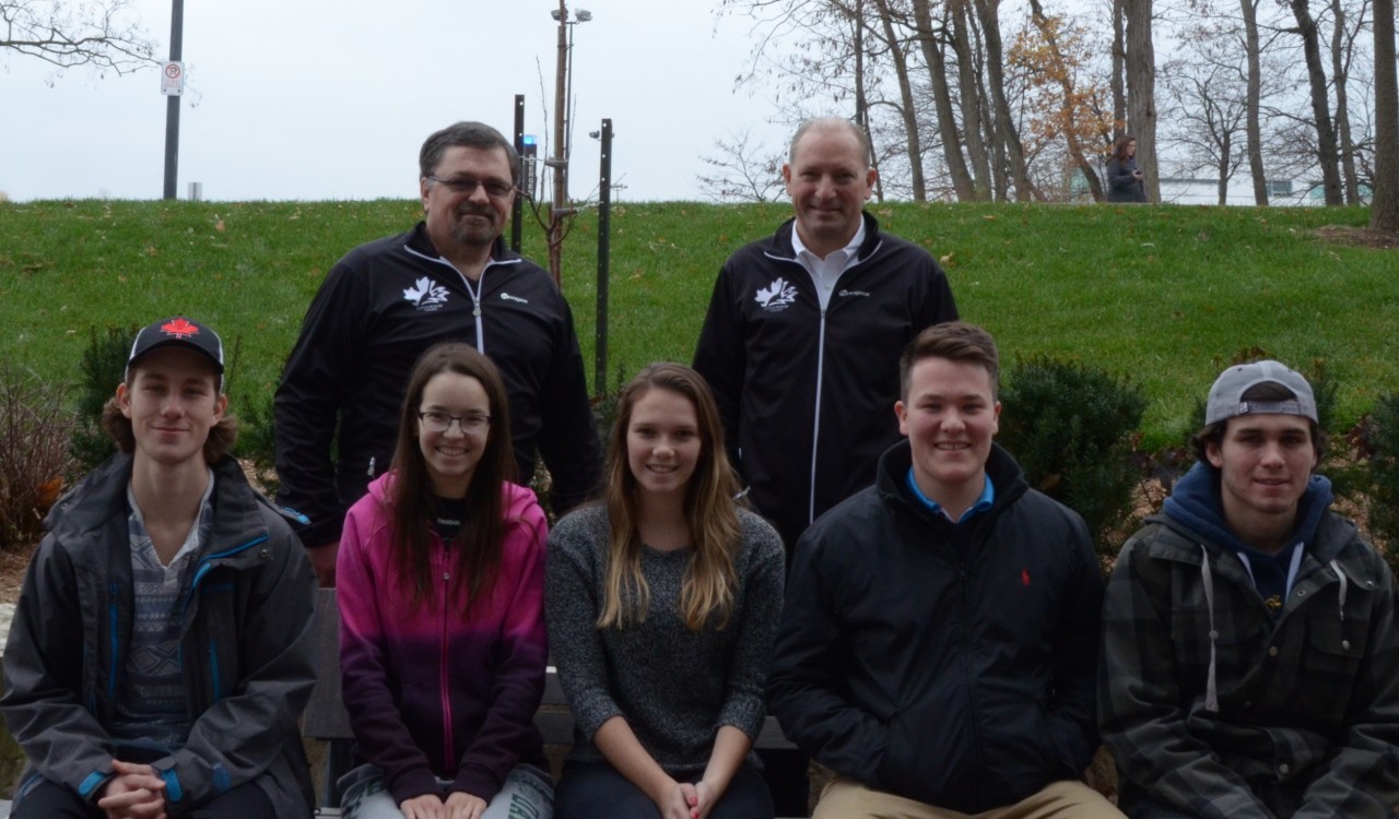 Sport Management 2P05 students (front row L-R) Robert Koen, Daria Fedorowyca, Emily Stratford, Mitch Johnson and Jake Sparks with (back row L-R) Ted Roworth and Paul Vincent of CanoeKayak Canada - Western Ontario Division.
