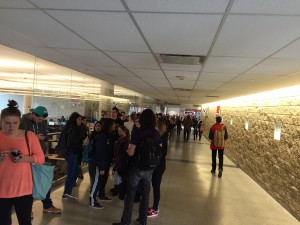 Students lineup for exams in the hallway near "the fishbowl" at Brock University Dec. 14.