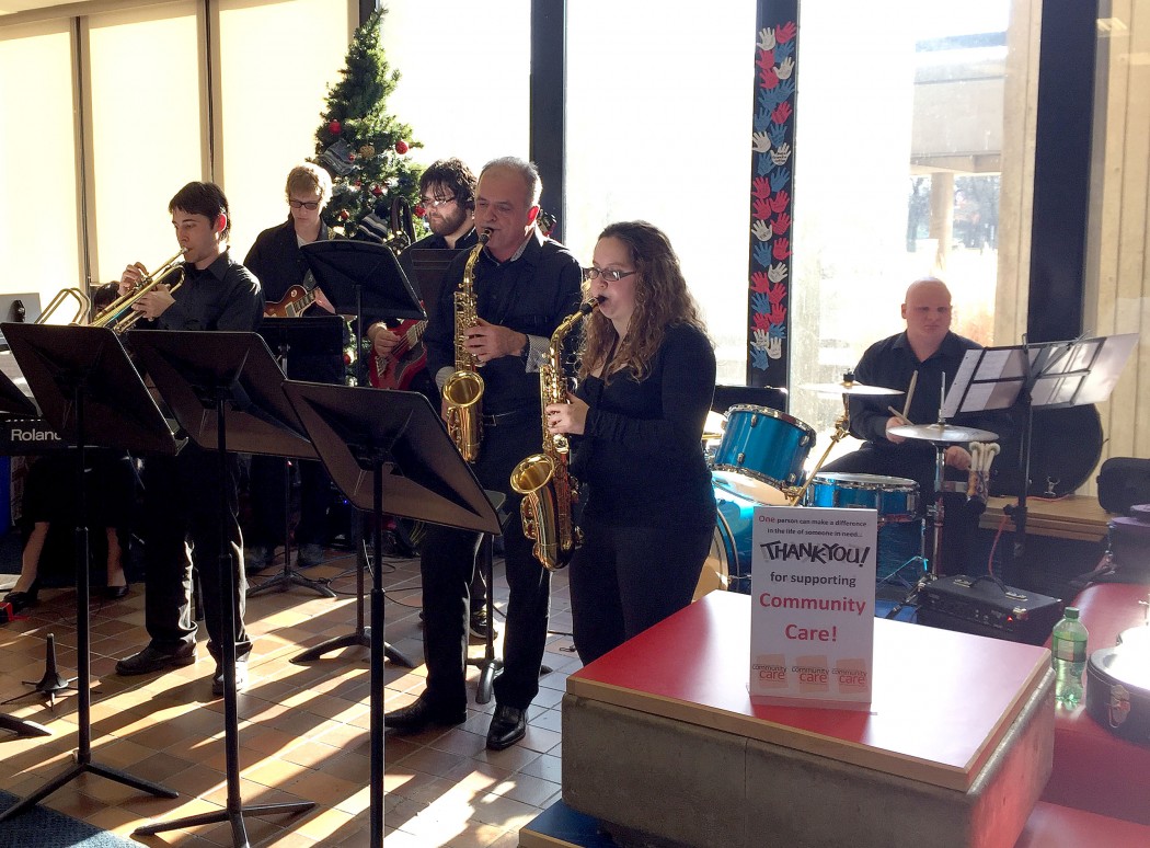 Musicians play in Schmon Tower lobby.