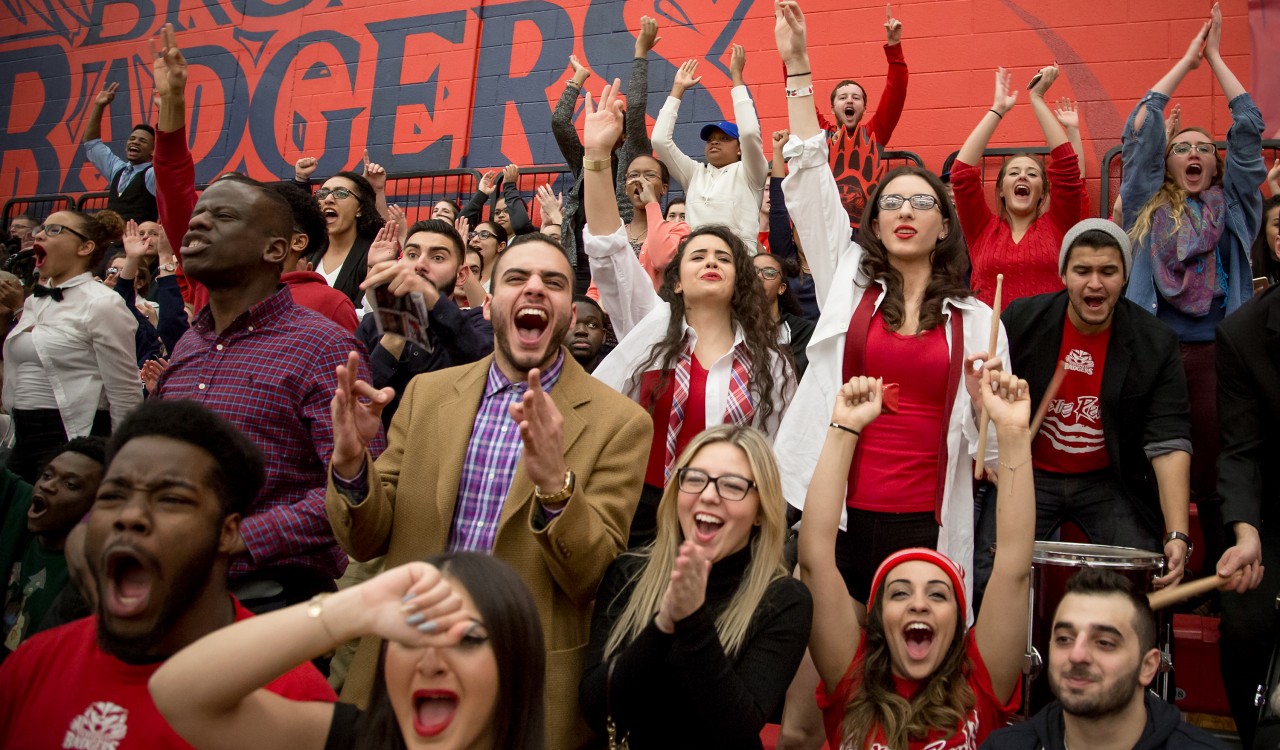 Fans cheer on their Brock basketball teams at the President's game. The theme of the games was suits and sneakers.