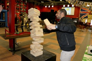 Satbir Singh plays a game of giant Jenga during a games fair at Isaac’s Thursday afternoon. The event was part of the Brock University Students’ Union Frost Week schedule.