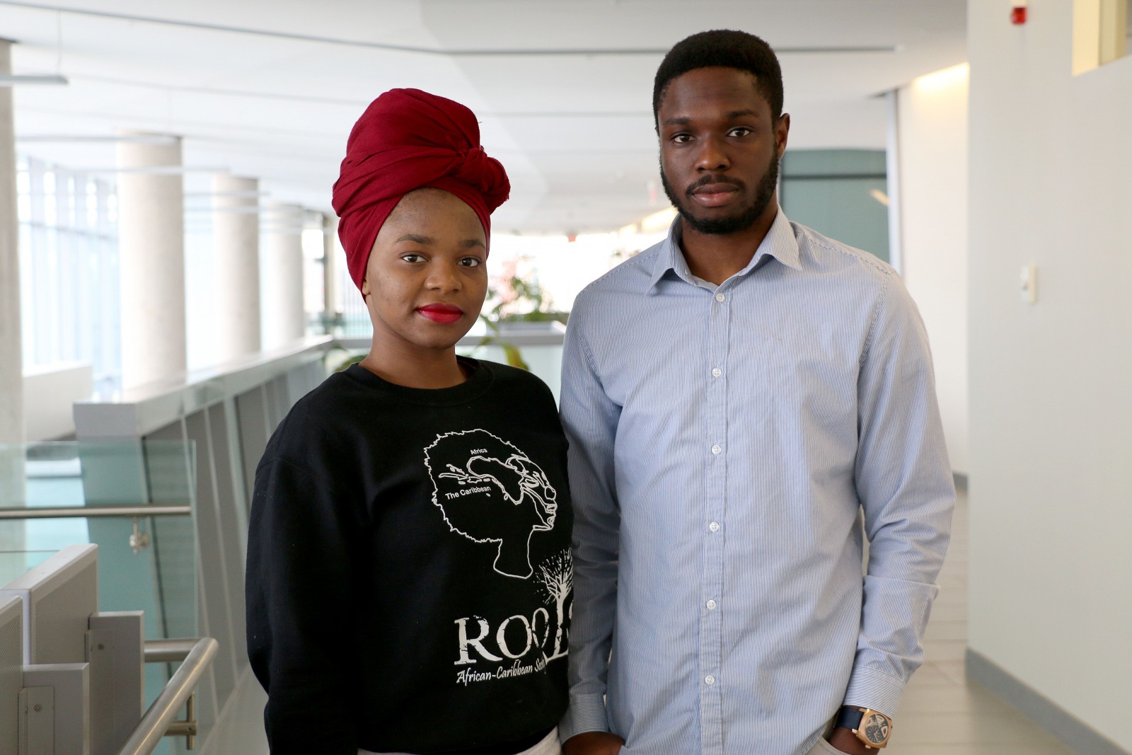 Merveilles Tshisuaka, left, and Francis Akpotu, public relations officers with the ROOTS African Caribbean Society.