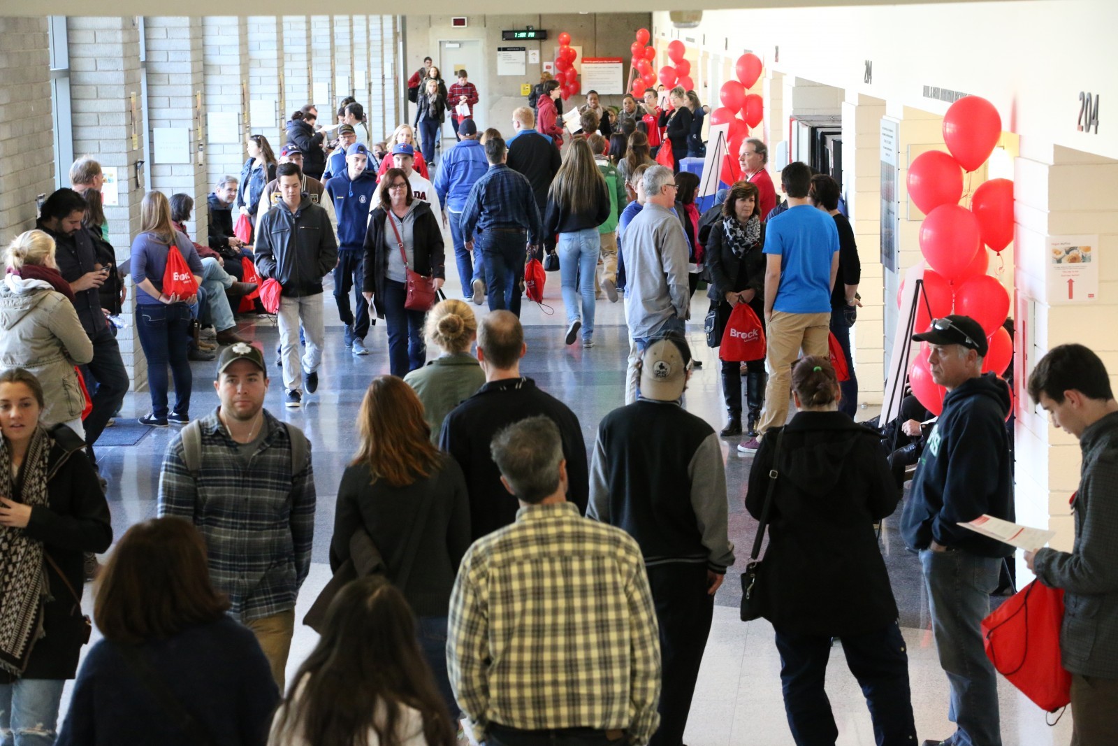 Prospective students and parents check out Brock University.