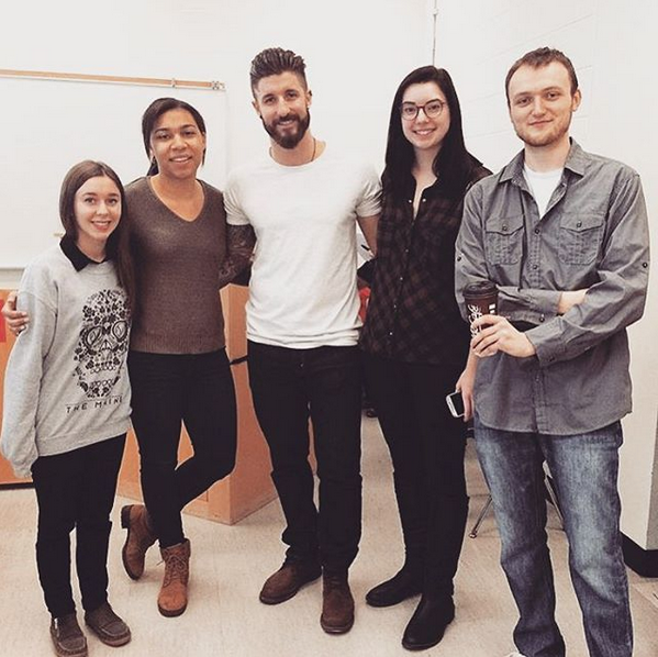 Amazing Race Canada winner Gino Montani poses with Brock University students during a campus visit Tuesday.