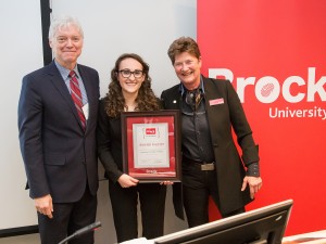 Jennifer Philpott, middle, received the Co-op Student of the Year Award for 2015 from Interim Dean of the Goodman School of Business Barry Wright and Vice-Provost of Teaching and Learning Anna Lathrop.