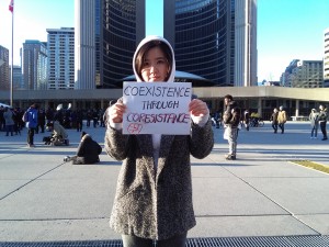 Ha Min Kim, a student in the MA in Critical Sociology, participates in a Black Lives Matter protest in Nathan Phillips Square in Toronto.