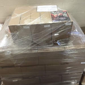Surgite magazine on boxes bound in plastic.