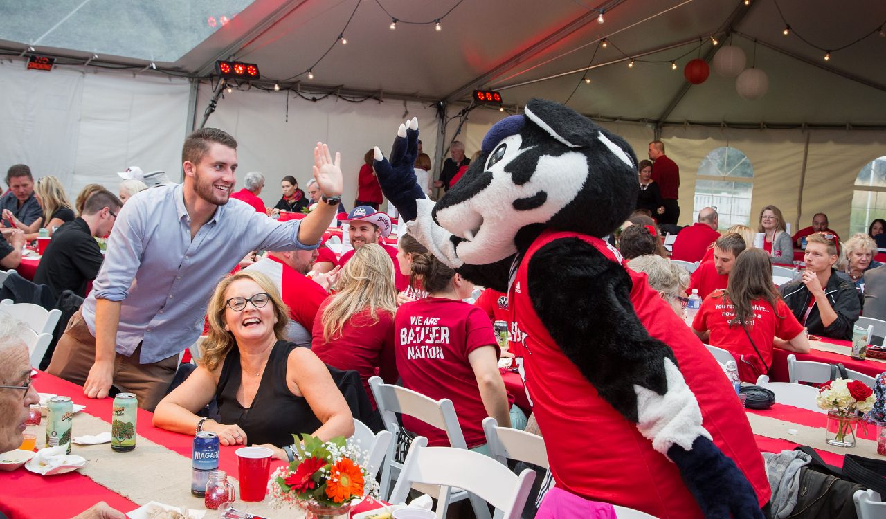 The annual Red Dinner is a big draw for alumni and students alike during Homecoming Weekend.