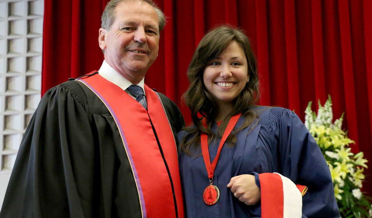 Board of Trustee chair John Suk presented undergraduate Kaitlyn Daw, from the Faculty of Humanities, with the Spirit of Brock award Wednesday morning.