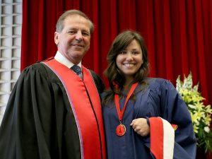 Board of Trustee chair John Suk presented undergraduate Kaitlyn Daw, from the Faculty of Humanities, with the Spirit of Brock award Wednesday morning.