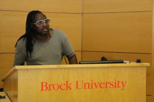 Professor Rinaldo Walcott, of the University of Toronto, speaks to students from the joint PhD in educational studies at Brock University Wednesday, July 13.