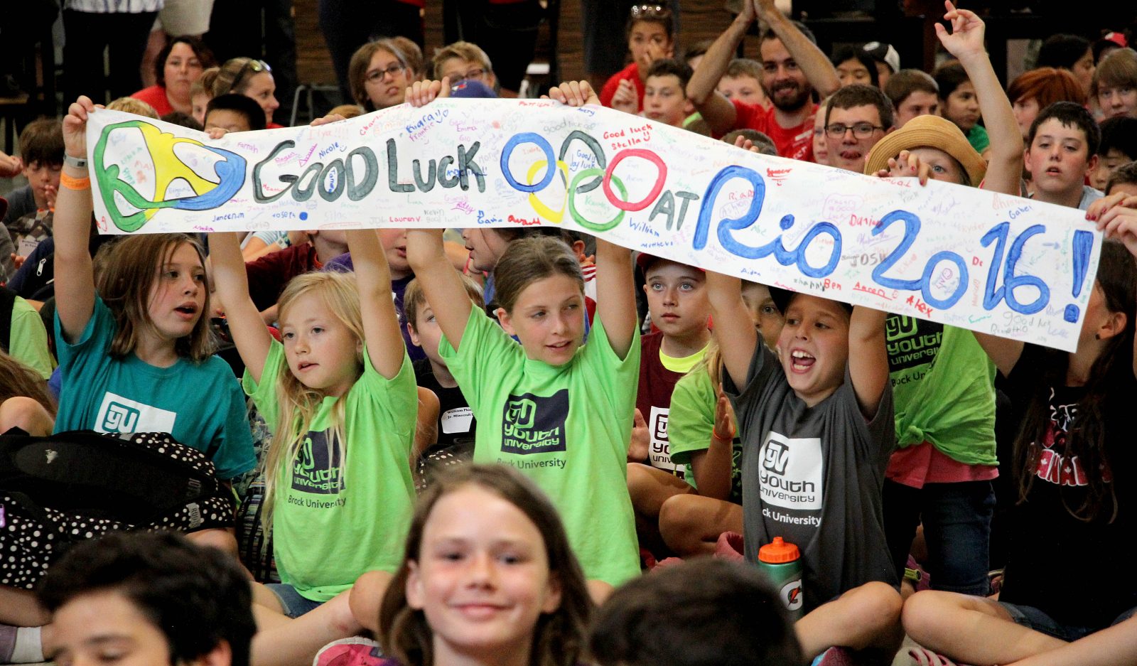 Hundreds of Youth University participants, sports campers, staff and faculty gathered for Olympic send-off party.