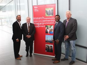 From left to right: Mayor Walter Sendzik, David Siegel, Charles Conteh and Michael Ripmeester