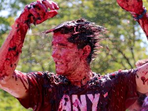 Brock University first-year student Ryan Mohaupt took part in Grape Stomp Friday. The University's messiest tradition saw more than 1,000 students stomp a metric tonne of grapes in Jubilee Court. The event kicks off Homecoming Weekend.
