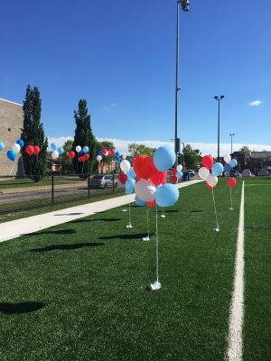 Balloons dot Alumni Turf Field