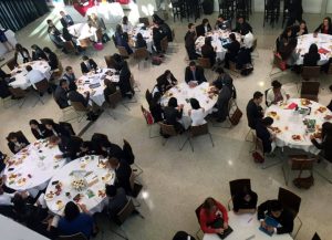Students from Brock's Goodman School of Business network with employer partners over breakfast.