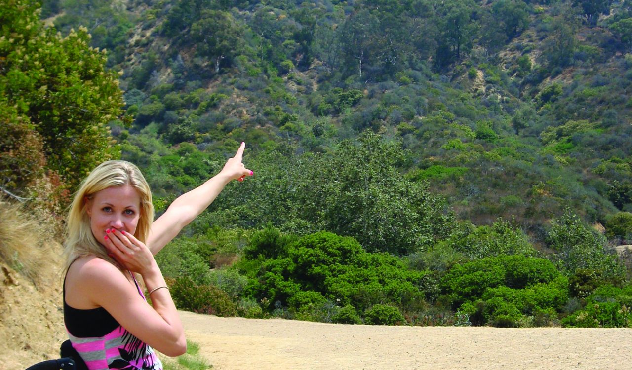 Christi Rougoor points to the Hollywood sign during her first trip to California.