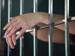 Female hands in prison