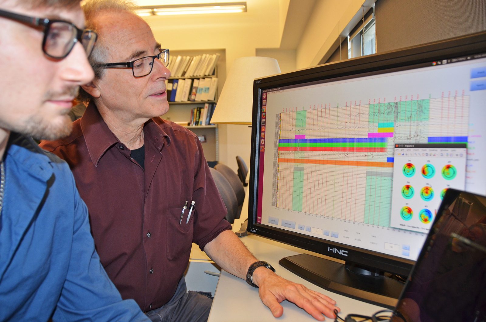 Sid Segalowitz looks over brainwave data
