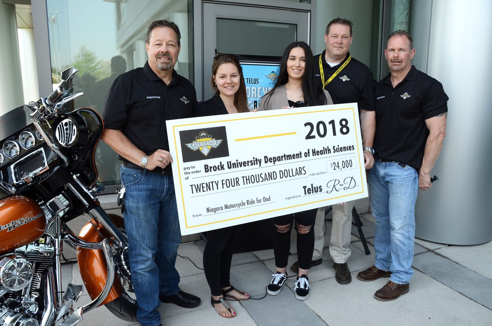 Ride for Dad cancer research cheque