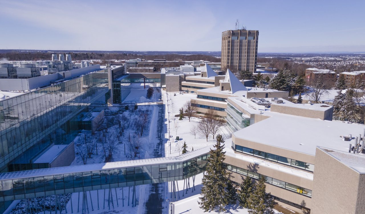 An aerial photo of Brock University's main campus blanketed in snow