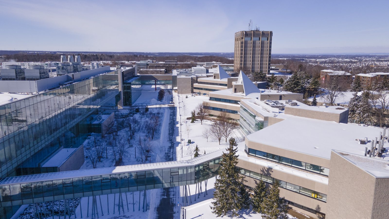 An aerial photo of Brock University's main campus blanketed in snow