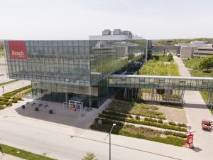 An aerial view of a glass building on Brock University's main campus.