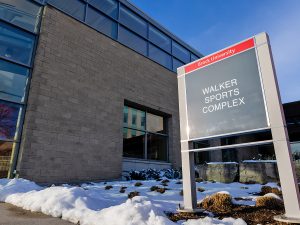 A sign for the Walker Sports Complex on a sunny winter’s day.