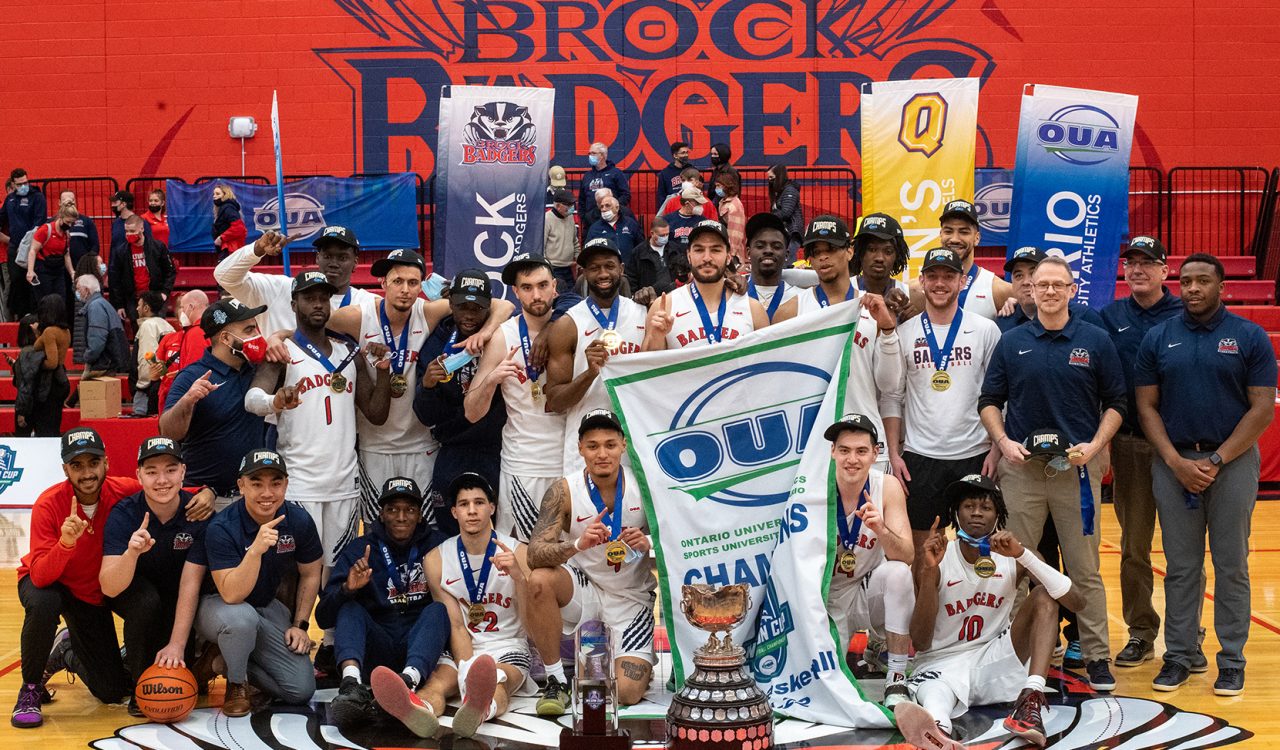 A basketball team celebrates after winning a provincial title.