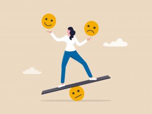 An illustration of a person balancing a yellow smiley face in one hand and a yellow frowning face in the other hand. She stands on a long board that is balancing on a yellow face with a neutral expression.