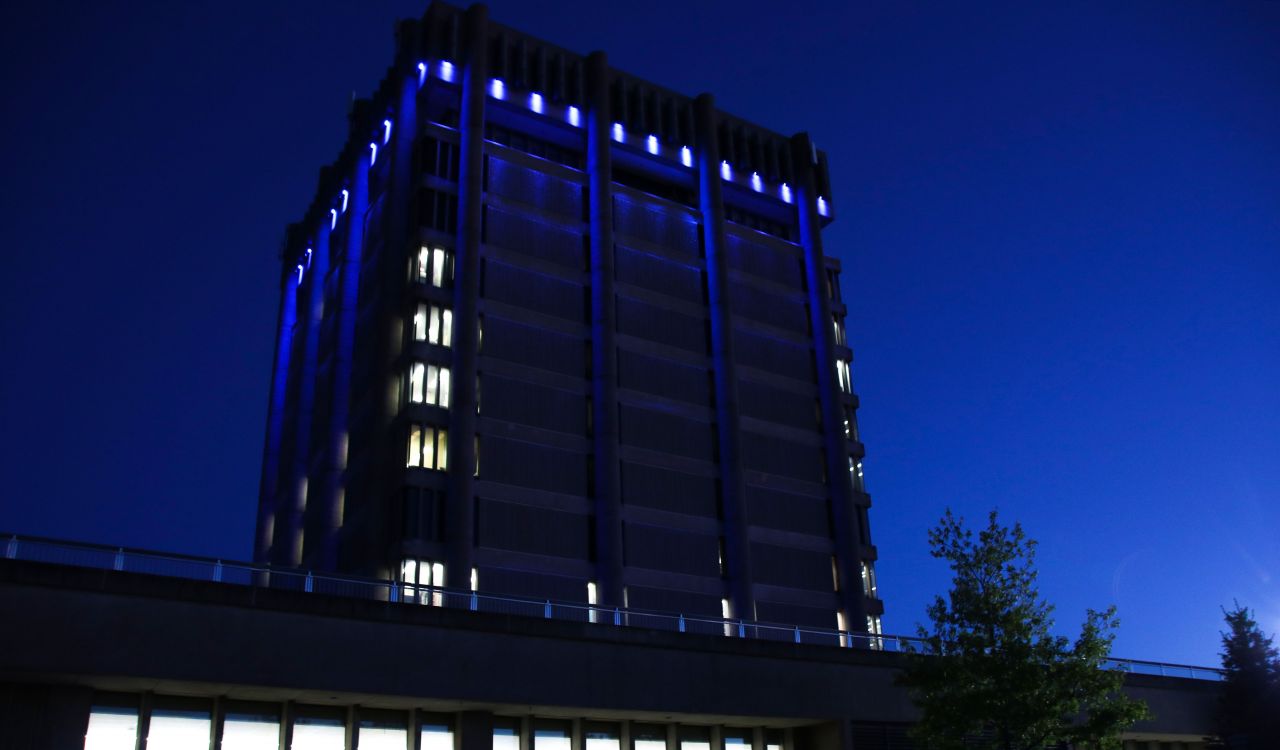 Brock University’s Arthur Schmon Tower lit in blue LED lights.