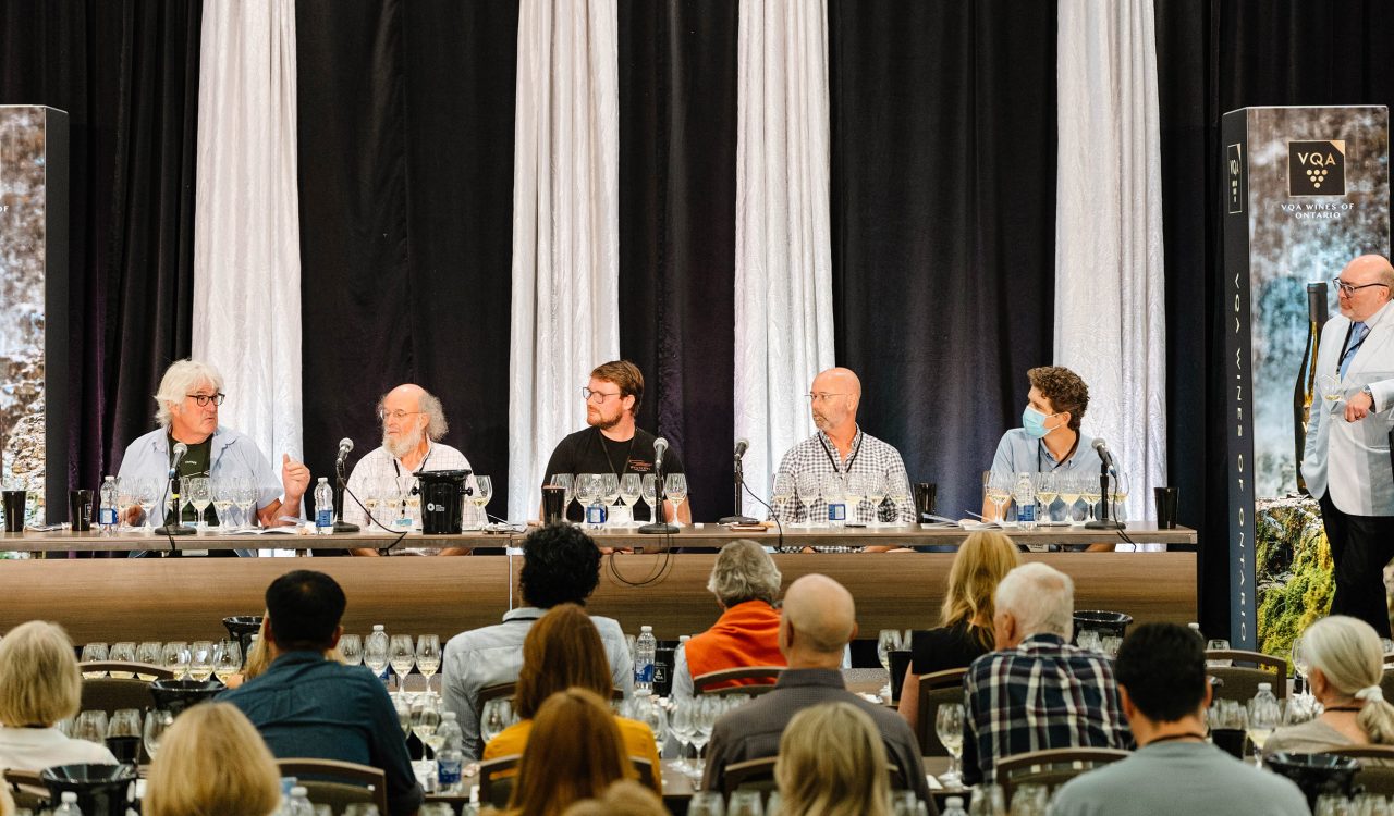 A group panelists with flights of Chardonnay discuss cool climate winemaking.