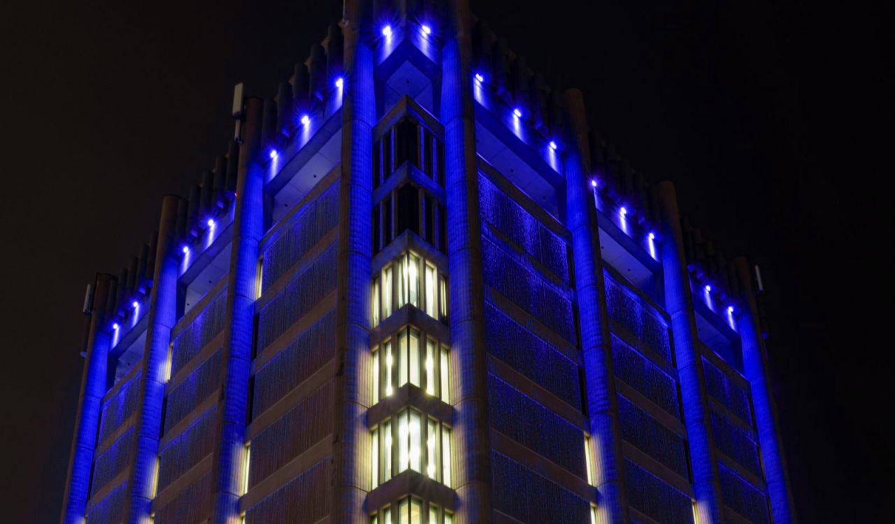 Brock University’s Arthur Schmon Tower lit in blue LED lights.