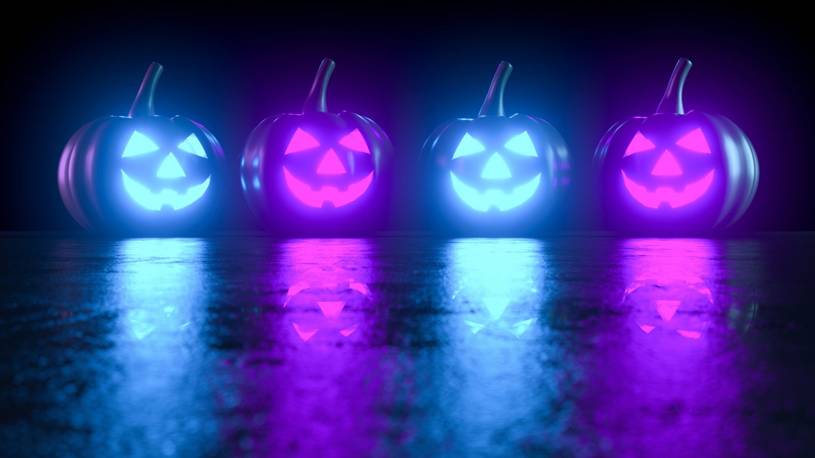 Four jack-o-lanterns, two lit in blue and two in purple, on a dark background.