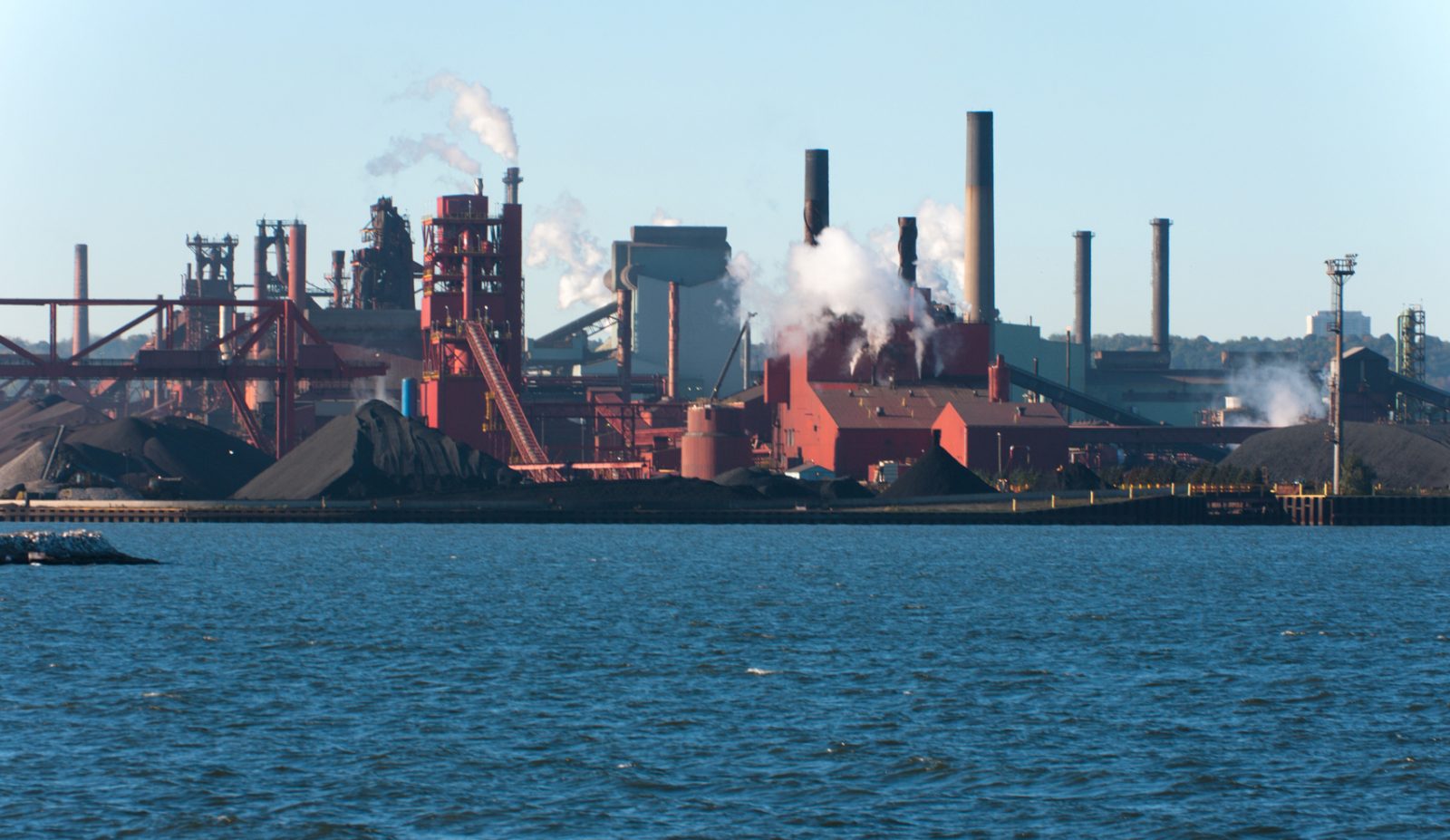 View of Hamilton harbour and steel mills, with water leading to the industrial area.