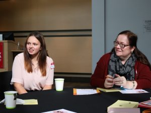 Fourth-year Medical Sciences student Kiara Kalenuik facilitates a small group discussion while Department of Nursing Associate Professor Sheila O’Keefe-McCarthy listens.