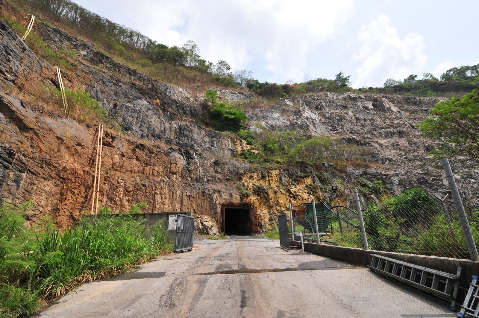 Ramp to enter an underground gold mine in Ghana, dug into the side of a pit