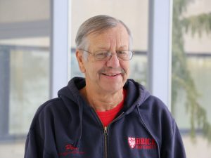 A close-up portrait of retired Brock University Senior Storekeeper Peter Barclay.